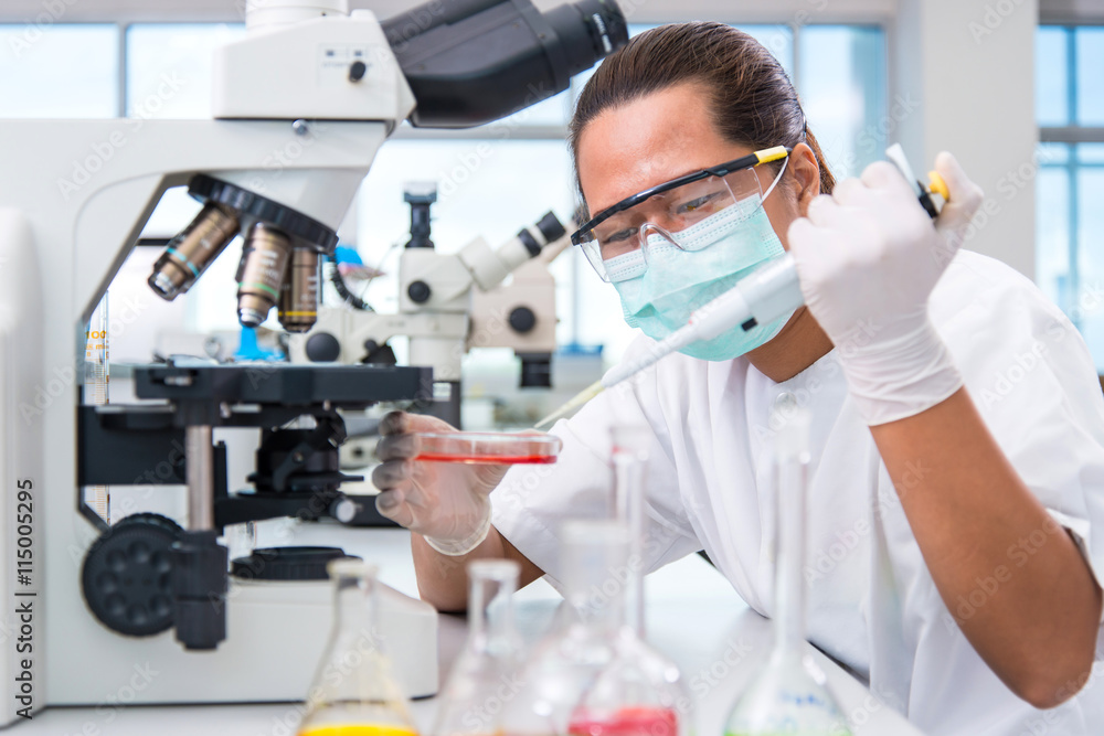 Scientists are conducting experiments in the life science resear Scientists are conducting experiments in the life science resear
