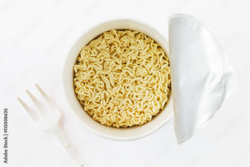 Instant noodle cup and fork, top view, isolated on white backgro Instant noodle cup and fork, top view, isolated on white backgro