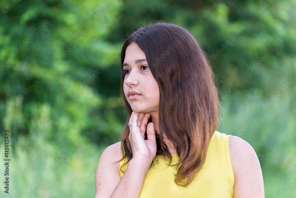 Portrait of girl with dark hair on the nature Portrait of girl with dark hair on the nature