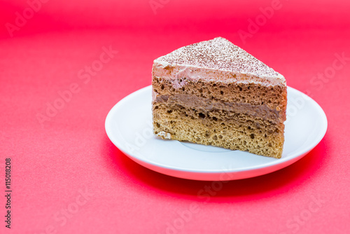  cake and coffee cup on colour background