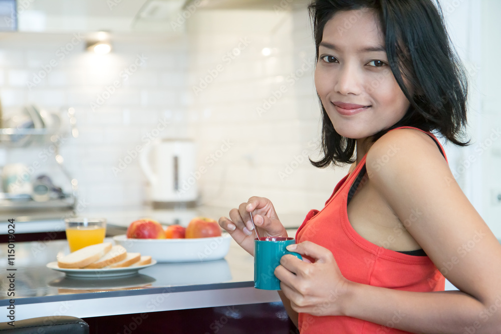 Woman with drink and food at the bar kitchen Woman with drink and food at the bar kitchen