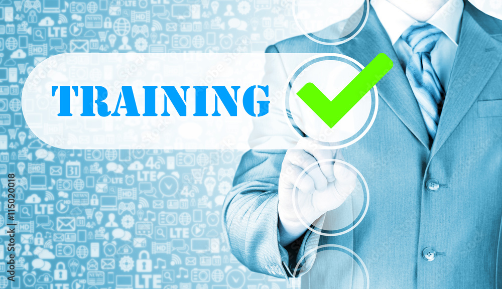 Businessman pressing touch screen interface training checkbox Businessman pressing touch screen interface training checkbox