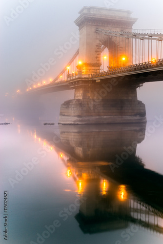 Prague, Charles Bridge and Mala Strana in a foggy day.