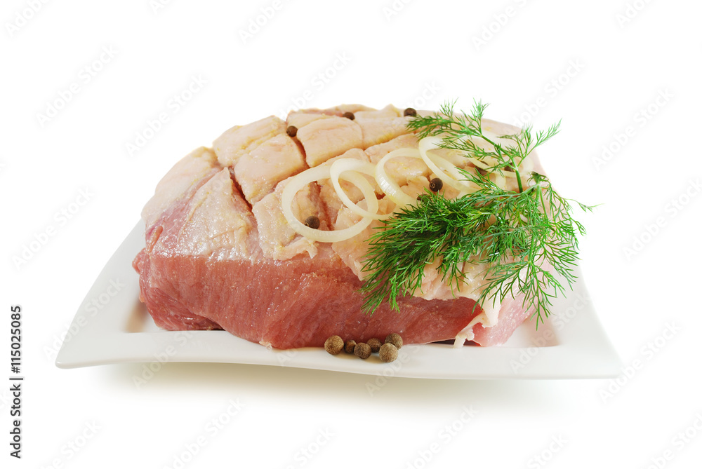 raw juicy pork with cutted scored skin isolated on a white raw juicy pork with cutted scored skin isolated on a white