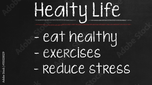 Healthy Life concept on Black chalkboard