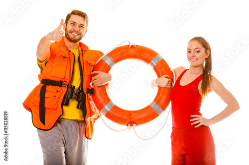 Lifeguards in life vest with ring buoy. Success.