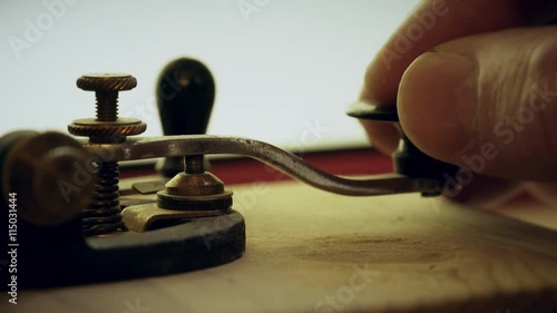 macro shot of a telegraph morse code key sending 4k photo