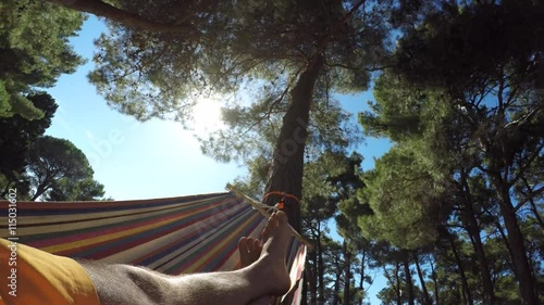 4K POV : Swinging in hammock
