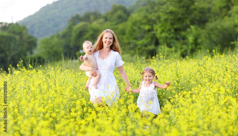 happy family, mother and children little daughter and baby runni happy family, mother and children little daughter and baby runni