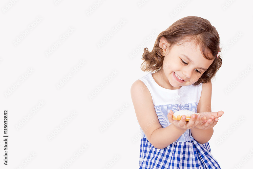 Happy girl holding kahk el Eid ( Feast Cookies ) Happy girl holding kahk el Eid ( Feast Cookies )