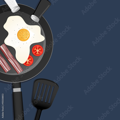 Popular breakfast with eggs, bacon and tomatoes in a pan