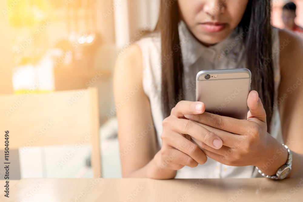 Beautiful woman using mobile or smart phone Beautiful woman using mobile or smart phone
