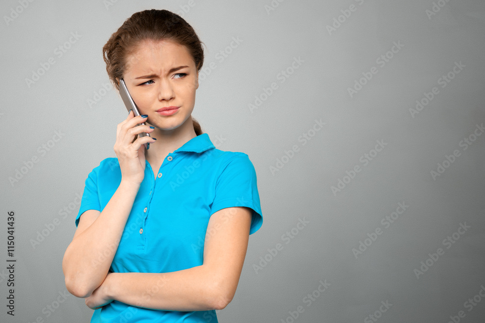 Young elegant woman talking on mobile phone Young elegant woman talking on mobile phone