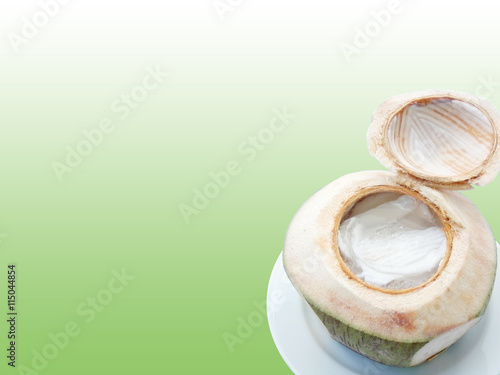 sweet in thai - woon ma praw orn - young coconut jelly on green background photo