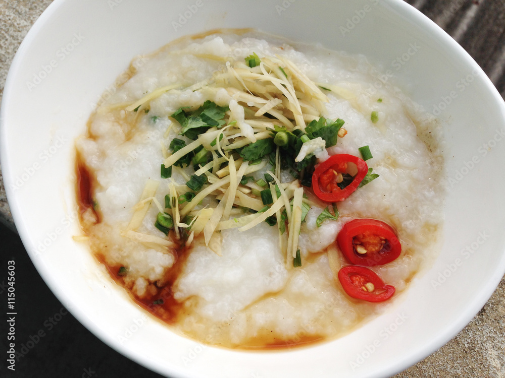 asian food - a bowl of congee with minced pork on grunge background

keyword