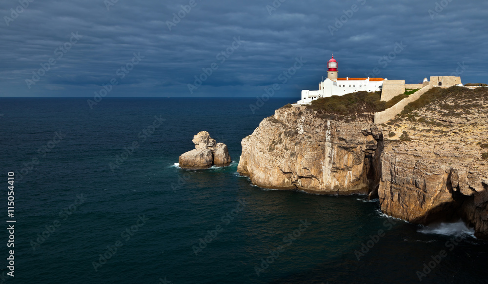 Coastal lighthouse on the western tip of Europe the Cape S.Vicente autumn cloudy morning, Sagres, Cabo de S.Vicente, Algarve, Portugal