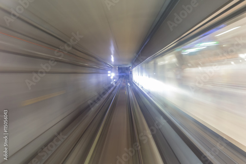 Subway tunnel with blurred light tracks in the gallery - Concept