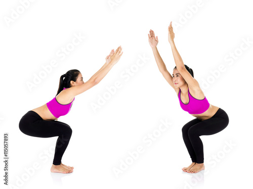 Yoga woman - pretty asian female in active wear doing yoga