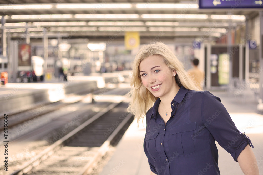 Fototapeta premium Woman at platform waiting for the train 