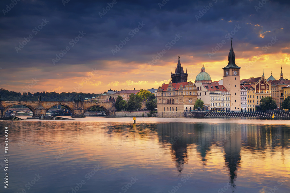 Prague. Image of Prague riverside and Charles Bridge, with reflection of the city in Vltava River.