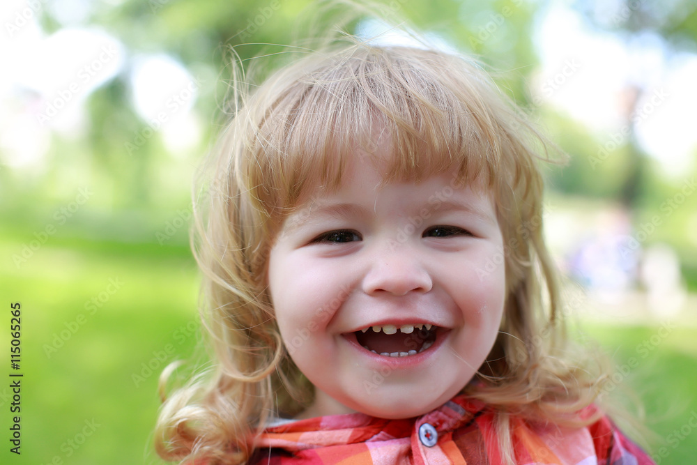 happy small boy on green natural background happy small boy on green natural background