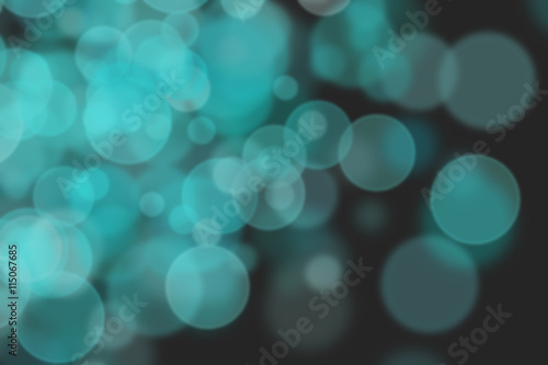 Colourful abstract bokeh design on a black background