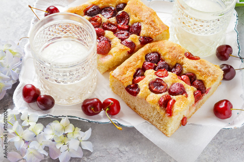 Italian sweet Bread Focaccia with Cherries for Breakfast or Lunc photo