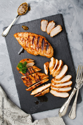 Grilled chicken fillets in a spicy marinade