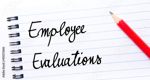 Employee Evaluations written on notebook page