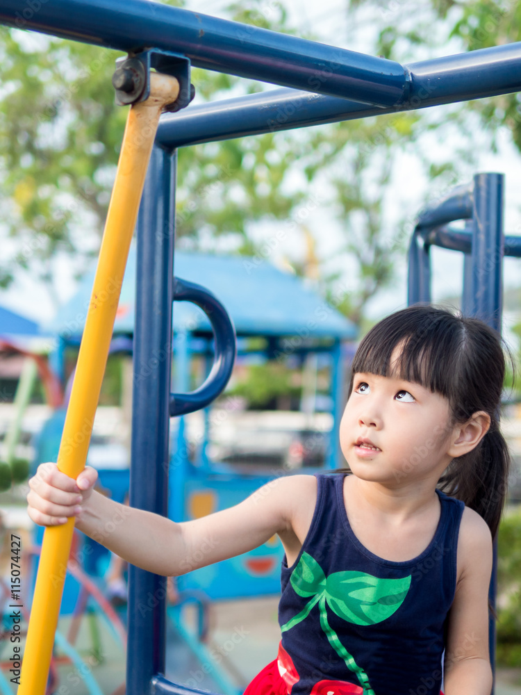 Fototapeta premium asian baby child playing on playground