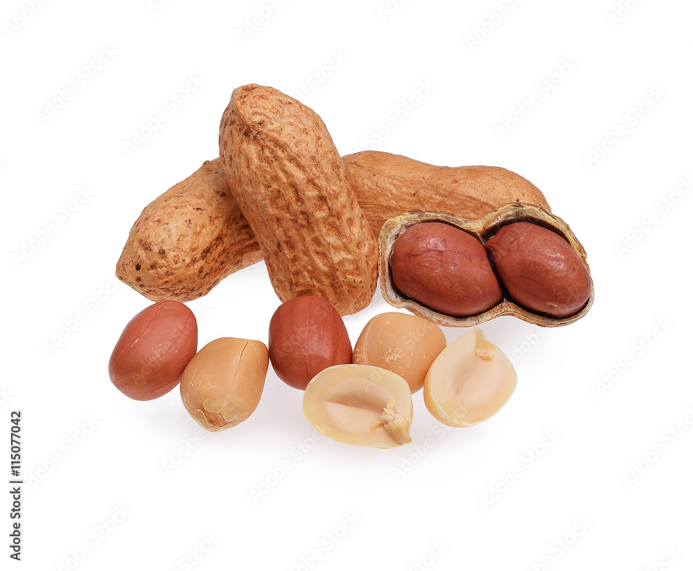 A pile of roasted peanuts isolated on white background A pile of roasted peanuts isolated on white background