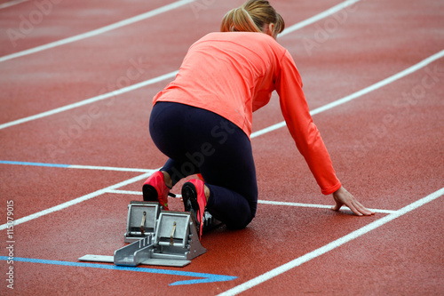 Sprinter leaving starting blocks