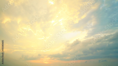 A new heaven and earth concept: Dramatic sun ray with yellow sky and clouds dawn texture background