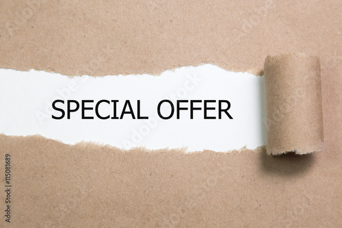 Special Offer appearing behind torn paper.