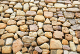 Medieval style stonewall texture for background from lower perspective