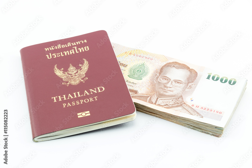 Thailand passport and Thai money isolated on white background Thailand passport and Thai money isolated on white background