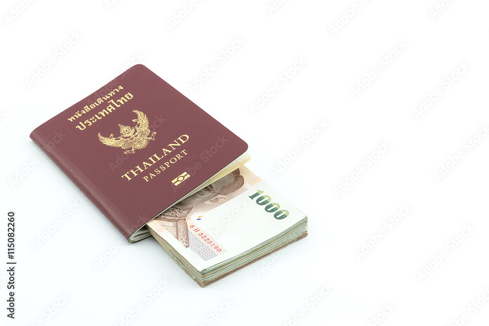 Thailand passport and Thai money isolated on white background Thailand passport and Thai money isolated on white background