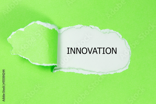 innovation word under torn paper
