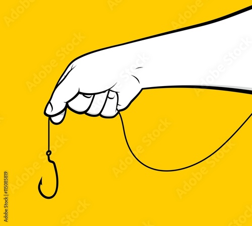 Hand holding fish hook
