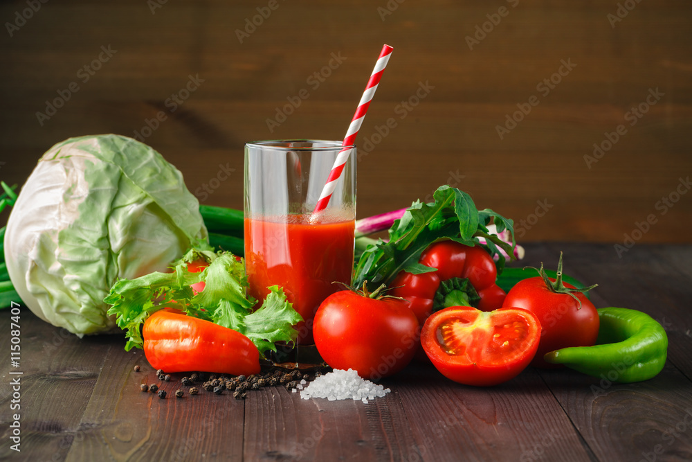 Fresh tomato juice on the rustic table. Fresh tomato juice on the rustic table.