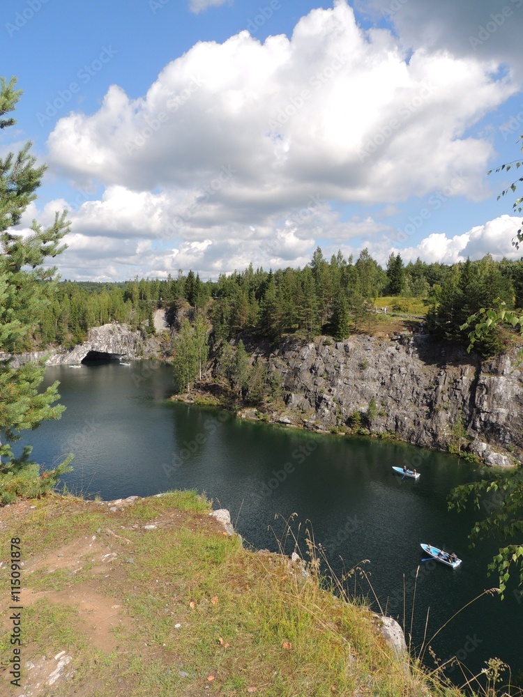 Fototapeta premium nature landscape marble quarry with water summer