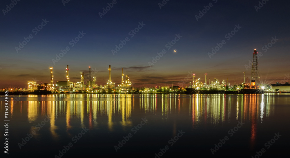Oil refinery industry plant along twilight at morning