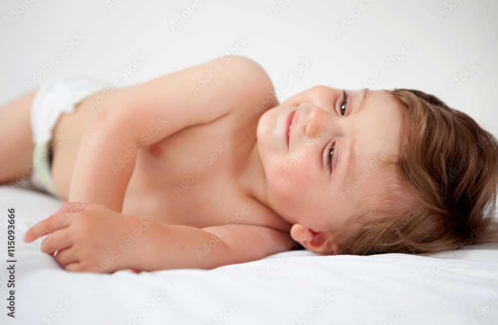 Baby with one years old getting out of bed Baby with one years old getting out of bed