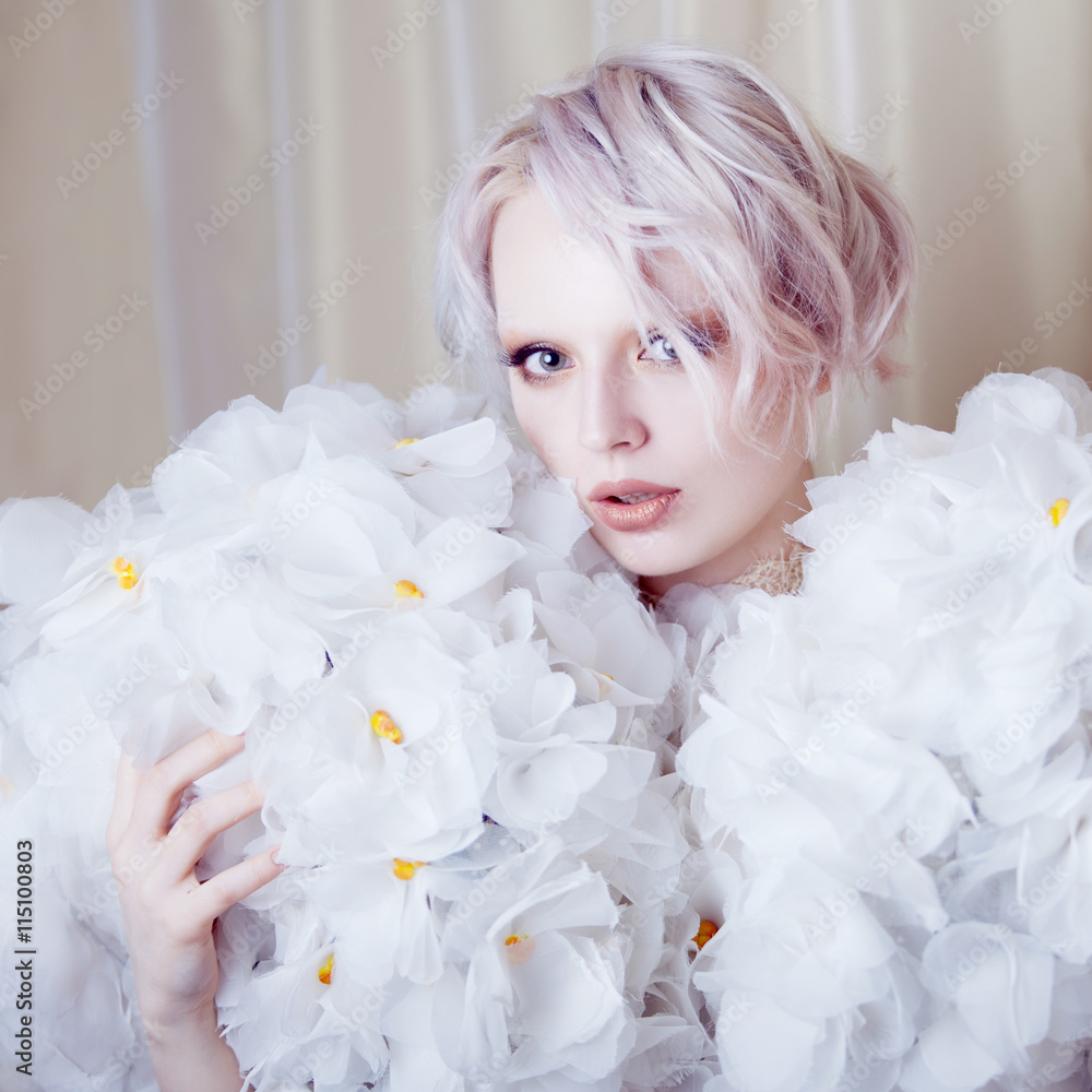 Fashion Beauty Model Girl in white Roses. Bride. Perfect Creative Make up and Hairstyle.