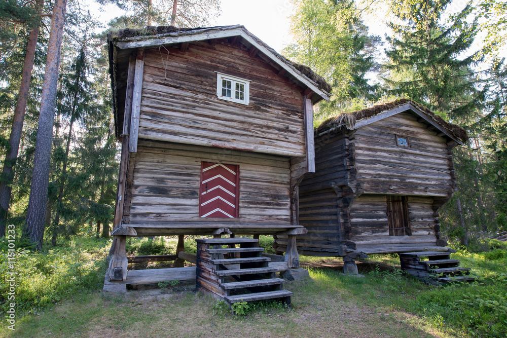 An old historic houses with grassroofs in Elverum, Norway An old historic houses with grassroofs in Elverum, Norway