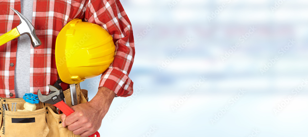 Builder handyman with construction tools. Builder handyman with construction tools.