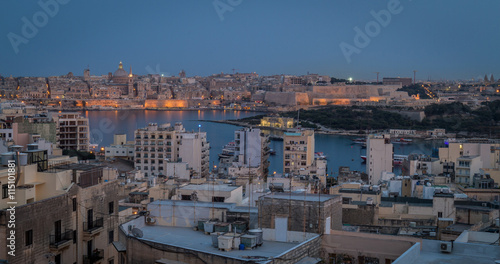 evening dusk over city in Malta from rooftop © Donna White