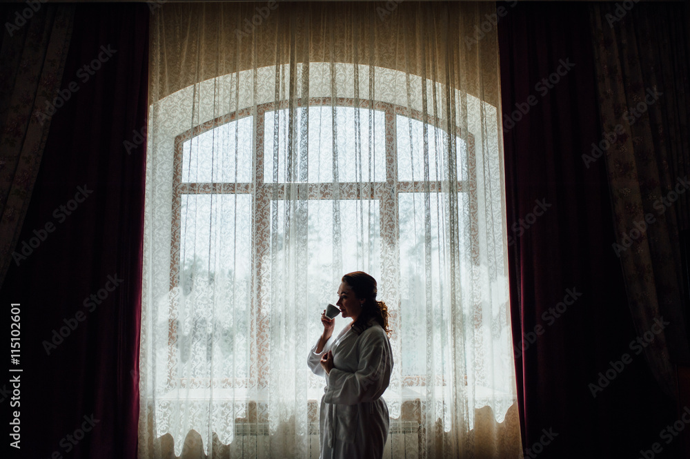 Fototapeta premium young woman wearing bath gown