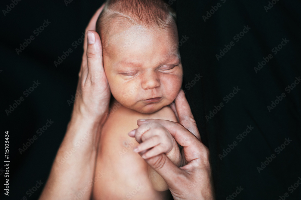 Fototapeta premium Newborn in mother's hands