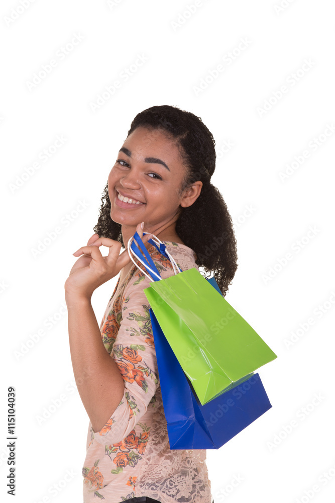 Young woman holding shopping bags, isolated on white Young woman holding shopping bags, isolated on white